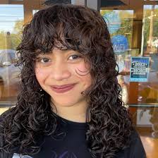 Curly girl ❤️‍🔥 by Mikala at our Canton location. This perm is perfection!