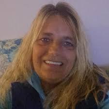 Where does the memorial bench at Pass A Grille belong?