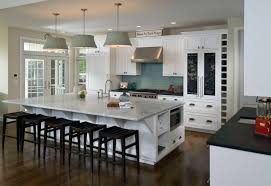 Pair a wooden island with a daring splash of color. 15 Kitchen Islands With Seating For Your Family Home