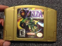 The most prominent feature of the legend of zelda: Legend Of Zelda Majora S Mask Nintendo 64 N64 Gold Holographic Collector 1791689155