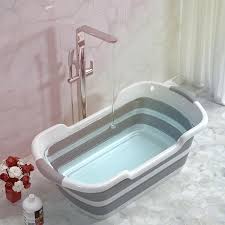I'd go with an inflatable tub for the shower because they're soft and they can be dried out, deflated, and stored away without taking up much room at all. Foldable Baby Shower Bathtub Portable Silicone Pet Dog Bath Tubs Accessories Collapsible Laundry Storage Basket Inflatable Portable Bathtubs Aliexpress
