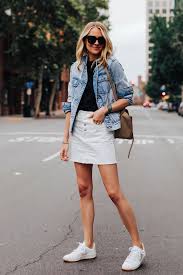 Fashion Jackson Wearing Oversized Denim Jacket Black T Shirt Madewell White Denim Skirt Veja V 12 White Sneakers White Sneakers Outfit Fashion Jackson Fashion