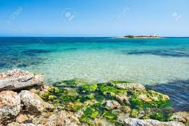 Imagefilm vom hotel cretan malia park auf kreta ► hier günstig buchen: Schoner Strand Mit Turkiswasser Und Steinen Malia Kreta Insel Griechenland Lizenzfreie Fotos Bilder Und Stock Fotografie Image 46041358