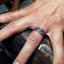 Best Tattoo Ideas For Men We Have A Photo Gallery Featuring Cool And Meaningful Tattoo Ideas And Wedding Band Tattoo Tattoo Wedding Rings Wedding Ring Tattoo