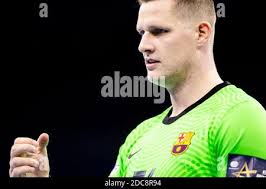 Kiel, Germany. 19th Nov, 2020. Maja Lynn Lederer is standing with an action  sign in front of the Kiel State Chancellery. The 19-year-old is the  initiator of the petition "Stop deportation of