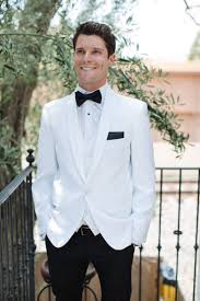 Black And White Coat For Boys The Old Hollywood Glam Wedding Style With The Groom In A White Coat And Tailored Pants Photo Hollywood Glam Wedding White Tuxedo Wedding Summer Wedding Attire