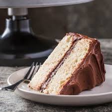 Our Vegan Yellow Layer Cake Stands Tall For Any Celebration But Nailing The Recipe Was One Of Our Biggest C Yellow Cake Recipe Cupcake Cakes Vegan Yellow Cake