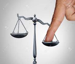 Judge wooden gavel with law book and golden scales. Tip The Scales Of Justice Concept As A The Finger Of A Person Stock Photo Picture And Royalty Free Image Image 96254158