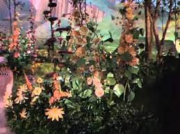 Center stage design for the munchkinland scenes in a stage version of the wizard of oz. Dorothy Entering Technicolor Youtube