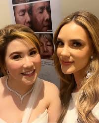 Michelle Cohn junto a @oliviaquido