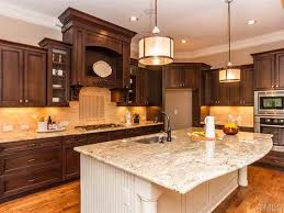 The paint of that kitchen cabinet doesn't look like it's in pure white. Tuscany Cherry Cabinet Perimeter Antique White Chocolate Glaze Transitional Kitchen Raleigh By Kelly Bidwell Bukowski Houzz