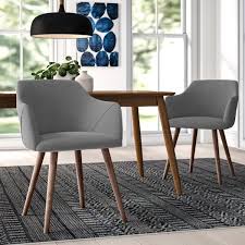 With their wood base and bright white upholstered seat, these chairs bring a sense of elegance to any table. Allmodern Upholstered Arm Chair Reviews Wayfair