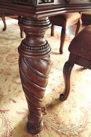 Usually ships within 5 to 7 days. North Shore Dining Table D553 35 Dark Brown By Ashley Furniture