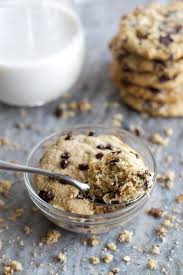 Just a handful of basic mix your own mug cookie together and in just a minute, this could be yours! Chocolate Chip Cookie Dough Mug Cake Running With Spoons