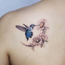 Watercolor tattoos are becoming more and more popular, and this watercolor hummingbird tattoo design is a gorgeous example! Hummingbird Tattoos Main Themes Tattoo Styles Ideas
