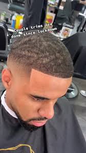 Barber in Manchester showcasing fresh trims during lockdown