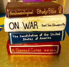 Fondant is gorgeous, sleek and can be simple or ornate. Graduation Book Cake Cakecentral Com