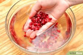 Pomegranates are a beautiful fruit, with a thick ruby skin covering shiny 'jewels' inside. 3 Ways To Eat A Pomegranate Wikihow