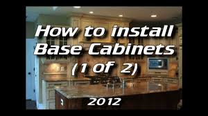 How To Install Kitchen Cabinets Installing Base Cabinets 1 Of 4 Installing Cabinets Installing Kitchen Cabinets Base Cabinets