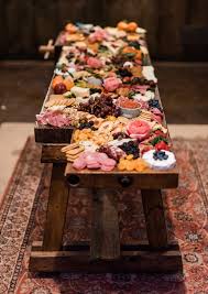 It is easy to put together, it's economical and your guests are going to love it! Feast For The Eyes Epic Grazing Tables Are Taking Over Green Wedding Shoes