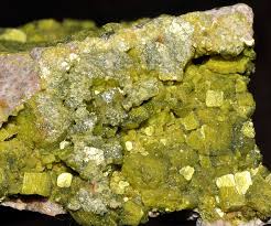 If this freaks you out, find some uranium glass (also called vaseline glass). Radioactive Uranium Ore