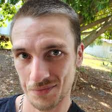 What could cause a smashed spark plug in cylinder 4 of a 2009 Subaru WRX?