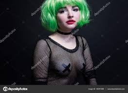 Photo portrait of a green-haired girl in the dress of the grid taped nipples  with black tape — Stock Photo © Alien_Zagrebelna 135781066