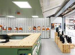 torafu architects designs kiosk style inspired retail freitag store in osaka