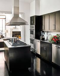 Brian Atwood Embraces The Downtown Drama Of His Soho Duplex Architectural Digest In 2020 Nyc Apartment Apartment Kitchen Black Kitchens
