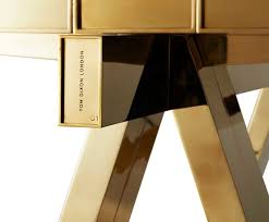 Featuring a strong & sturdy base, it has an elegant marble table top with natural white markings. Tom Dixon Turns A Dining Table Into A Solid Brass Sculpture Milan Metropolitan City Of Milan Italy
