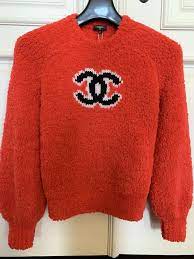 The trials of a childhood as an orphan and the successes of an accomplished businesswoman gave birth to an extraordinary character\u003b daring, free, and ahead of her time. Chanel 2019 Runway Fall Winter Knit Fuzzy Eu36 Red Sweater Chanel Sweater Fashion Design Clothes Sweaters