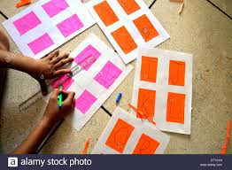 girl drawing abcd on colour chart mr 704 jodhpur rajasthan