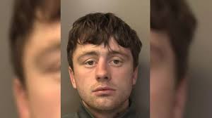 Police hunt wanted man after release from prison