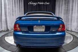 Image result for Dark Ming Blue 2004 Pontiac