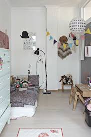 Peel and stick wallpaper adds visual interest while washable chalkboard paint turns an ordinary blank wall into an open canvas. 10 Excellently Eclectic Kids Rooms Tinyme Blog
