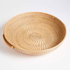 Made of plywood with woven banana leaf and solid wood legs. 18 Inches Hand Woven Tray For Coffee Table Circular Decorative Basket Tray Artera Round Wicker Rattan Tray Natural Serving Tray With Handles Brown Ottoman Kitchen Dining Serving Dishes Trays Platters
