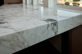 Here's a vanity made from rain forest green marble, the edge detail is a 1 5/8 miter. Mitered Edge Countertops Cost Reviews