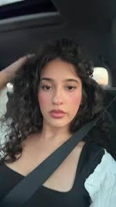 Emily in Paris Mindy Outfit Cadalout Launch Black Dress