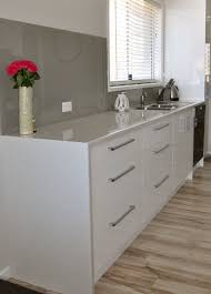 Waterfall Edge With A Laminate Bench Top Can Be A More Cost Effective Option To Stone Or Granit Laminate Kitchen Cabinets Laminate Kitchen Kitchen Renovation