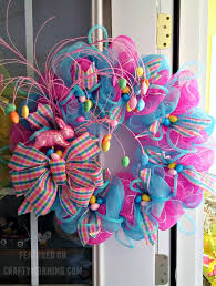 You don't need to spend a fortune on a wreath when you can pick up the supplies at the dollar store. Easter Deco Mesh Wreath Crafty Morning