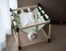 Here S A Round Up Of Diy Cat Hammock Tutorial Videos That Will Ensure You And Your Favorite Feline Can Kick B Diy Cat Hammock Cat Hammock Tutorial Diy Cat Toys