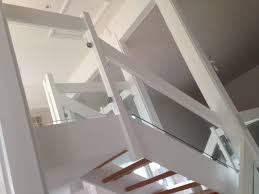 Luxury wide glass staircase with satin glass treads and clear glass railing. Staircase Glass Panels In Horsham Feature Internal Staircase Dorking Glass Surrey