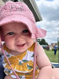 Branded Rebel's tiniest model! We do all sorts of custom designs. Here I  did a baby bucket hat and put Bella's name
