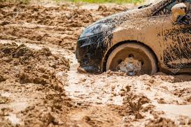 Here's how to get out. Close Up The Black Car Stuck In The Mud Can Not Fall Out Of Stock Photo Picture And Royalty Free Image Image 84128490