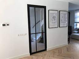 steel look taats deur van aluminium met onzichtbare scharnieren staal aluminium deuren binnendeuren buitendeuren deuren interieur
