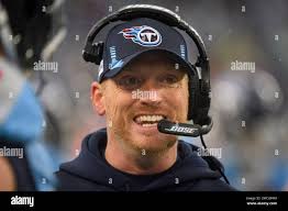 Tennessee Titans offensive coordinator Todd Downing works the sideline  during an NFL football game against the Miami Dolphins, Sunday, Jan. 2,  2022, in Nashville, Tenn. (AP Photo/John Amis Stock Photo