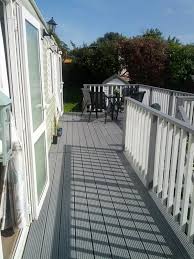 Decking In Cuprinol Ultra Tough Silver Birch Decking Stain Deck Paint Staining Deck Deck Colors