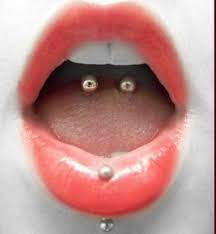 The Healing Process Of A Tongue Piercing With Pictures Tongue Piercing Snake Eyes Piercing Eye Piercing