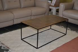 Anchor the room with a designer coffee table. Brass Topped Coffee Table Famous Uk Designer