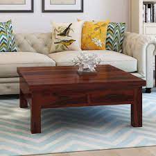 If you need more table space look at our nesting and stacked tables. Cheverly Modern Style Solid Wood 4 Drawers Square Coffee Table